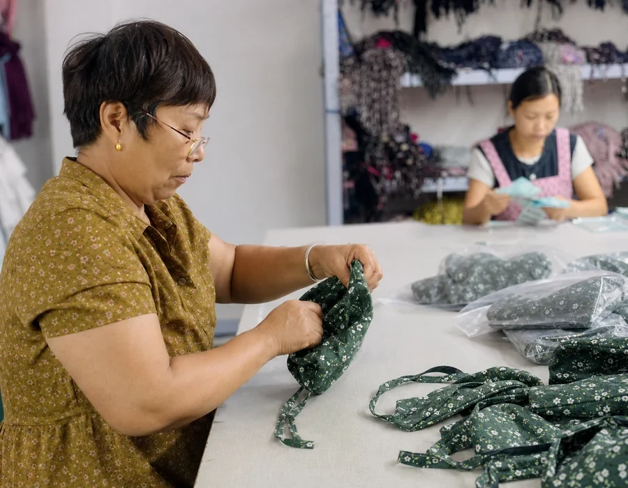 Scrub cap quality control inspection before wholesale packing